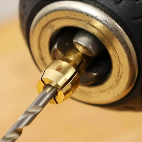Close-up of the 10pcs Mini Drill Chuck Adapter for Copper Rotary Tool Collet 0.5-3.2mm in use with a drill bit.