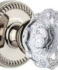 Close-up of Newport Rosette Fontainebleau Passage Door Knob Set Polished Nickel, glass detail, showing classic design in clear finish.