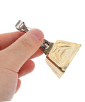 Hand holding stainless steel fishing bite alarms for rods