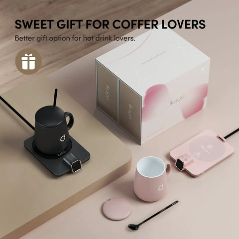 Level Up Your Morning Vibe This Smart Mug Warmer Game Changer Keeps Your Daily Brew Piping Hot With Precision Temp Control 15 Oz Ceramic Mugs Lids And Spoons Simple Cord Setup, includes black ceramic mug, pink cup, warmer base, spoon.