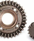 Close-up of Rear Differential Ring And Pinion Gears 8579 Silver Upgrade Kit for Unlimited Desert Racer, two metal gears shown.