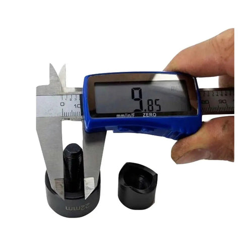 Digital caliper measuring component of 22mm And 20mm Hole Punch Kit With Knockout Die And Punch Set For Homebrew Projects.