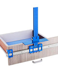 Pro Grade Cabinet Hardware Jig Kit featuring precision drill sleeves mounted on a drawer for exact knob installation.