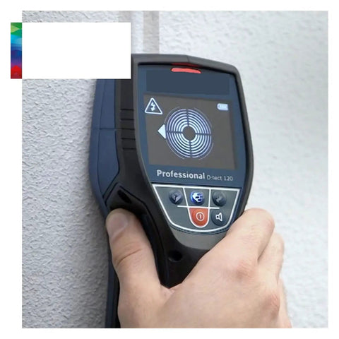 Pro Level Stud Finder And Wall Scanner Boasting Dead On Metal Scanning held against a wall showing digital display and controls.