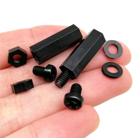 Three Sets Of M2 M2.5 M3 M4 Nylon Hex Spacer Columns Standoff Kit For PCBs And Motherboards With Screws Nuts And Washers Black 850 Pieces Ideal For Precise Component Spacing Alignment Quick Assembly And Durable DIY Electronics And Computer Builds.