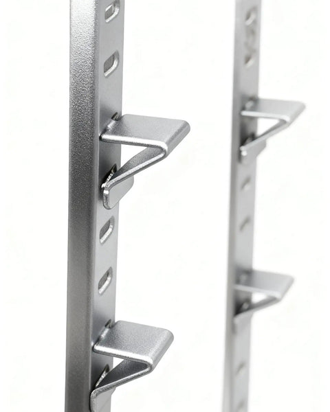 Close-up of Heavy Hitter 18 Piece Silver Steel Shelf Clip Kit, adjustable brackets gripping pilaster strip securely.