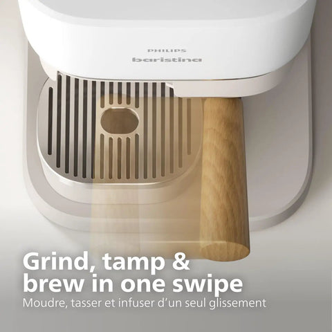 Compact Home Espresso Machine With Built In Grinder And 16 Bar Pump Auto Grinding Tamping And Brewing For Smooth Bean To Cup Coffee Without The Daily Grind Stress close-up of grinding and tamping area with wooden tamper.