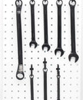 Pegboard Hooks Kit 100 Pack J Hooks Assortment Black No Split Barbs Snag Free holding wrenches on white pegboard