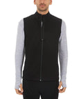 Heavy Duty Kick Ass 100 Percent Merino Wool Men Vest Expedition Grade Heavyweight thermal black mid layer worn by a model.