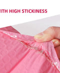 Close-up of Pink Bubble Mailers 100 Pack 12x18 And 4 Inch Thickened Self Sealing Shipping Envelopes showing high stickiness
