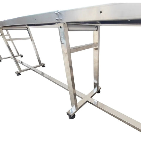 Stainless steel frame of Electric PVC Belt Conveyor With Adjustable Speed Desktop Industrial Transport Unit, viewed from side angle.