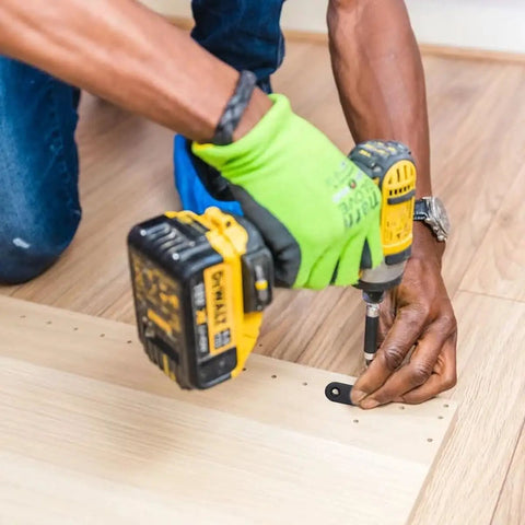 Working with Top Shelf Black Straight Corner Braces Heavy Duty Flat Steel Angle Mounts paired with screws for furniture reinforcement.