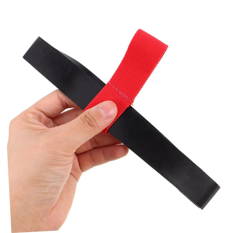 Hand holding Red Scuba Tank Holder Strap Oxygen Cylinder Carrier For Diving And Snorkeling, side mount accessory