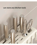 Rock Solid Wall Mounted Storage Rack With No Drill Setup Heavy Duty Carbon Steel Heat Resistant Kitchen Shelf holding kitchen tools.