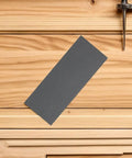High Quality Wet Dry Sandpaper Sheets For 21 Piece Grading Kit displayed on wooden surface, ideal for metal and wood projects.