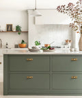 Kitchen with Antique Brass Cabinet Knob With Backplate Set on green drawers, 24mm zinc alloy, vintage brushed finish, six pack installation.