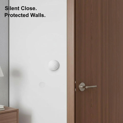 Peel And Stick Silicone Door Stopper No-Drill Self-Adhesive Wall Bumper in use on white wall with wooden door
