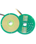 Ultra Slim Pcb Pancake Slip Ring With Straight Up Through Bore Layout providing copper circuits on dual green PCBs.
