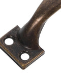 Close-up of vintage style metal cabinet handles set of 12 curved drawer pulls for kitchen cabinets, dressers, closets and doors.