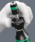 Adjusting torque on Kraftform Compact 60 Torque Screwdriver Set With Adjustable 1.2-3 Nm, 17-Piece Kit, ergonomic handle visible