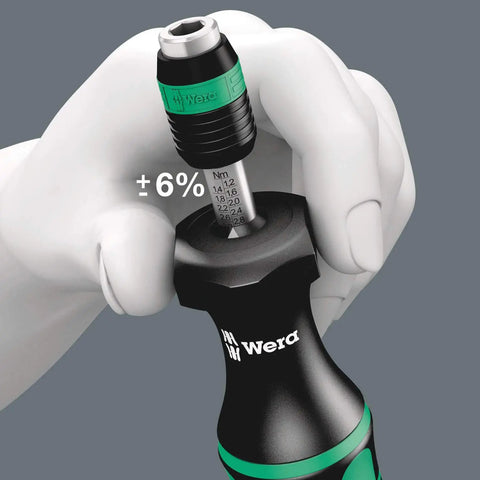 Adjusting torque on Kraftform Compact 60 Torque Screwdriver Set With Adjustable 1.2-3 Nm, 17-Piece Kit, ergonomic handle visible