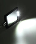 Pro Grade Telescoping Inspection Mirror With Dual LED Lights, close-up view with LEDs illuminating a surface.