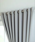 Close-up of XXXL Wall To Wall Blackout Curtains Set 18 Feet Wide, 2 Panels 108 By 120 Inches Light Gray on curtain rod.