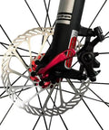 Hardcore Mountain Mechanical Disc Brake Kit With Front And Rear Calipers And Pro Levers Features Rapid Mount Setup And Tight Cable Routing, close-up of front caliper and disc.