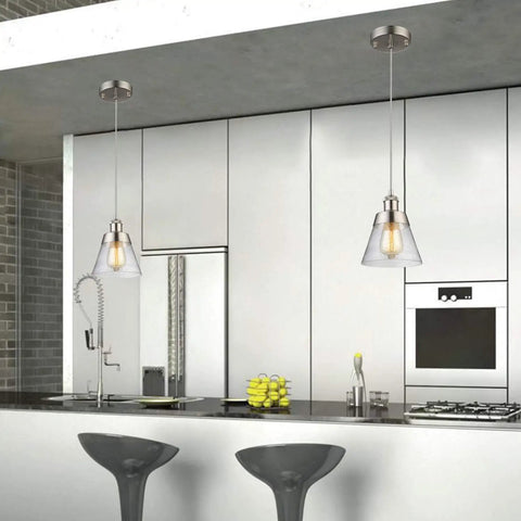 Dope Handblown Seeded Glass Pendant Light With Brushed Nickel Finish above modern kitchen island with stools