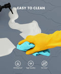 Cleaning liquid spill on Silicone 28x22 Inch Under Sink Tray, Waterproof Flexible Cabinet Liner For Kitchen Bathroom And Laundry.