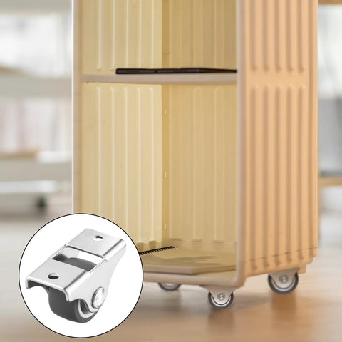 Four Pack Mini Rigid 1 Inch Caster Wheels Non Swivel Fixed Casters For Furniture Under Bed Storage Drawers attached to a cabinet