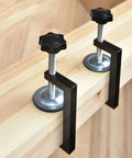 Rock Solid Reversible C Clamp For Woodworking And Plastic Projects 10 To 57mm Wide with adjustable black knobs and metal fixture.