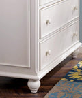 White dresser with One Inch Round Felt Furniture Sliders With Self Adhesive Backing For Hard Floors Noise Reducing Pads installed.