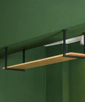 Beefy Heavy Duty Metal Ceiling Mount Shelf Brackets With Screws holding a wooden shelf in a green room for kitchen storage.