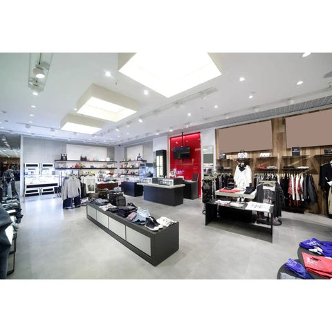 Modern clothing store interior with long neck PAR30 LED flood light bulbs 12.5W 3000K warm white illuminating the space