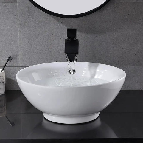 Ultra Sleek 16x16 Inch White Round Bathroom Sink Vessel Porcelain Ceramic For Above Countertop Install with water flowing from faucet