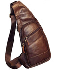 Genuine Leather Sling Backpack For Men And Women Crossbody Day Pack For Travel Outdoor Camping And Grab And Go Everyday Carry Durable Cowhide Leather With Zipper Closure And Adjustable Strap Brown angled view