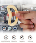 Close-up of two beige 54mm silicone steam rings for Breville/Sage espresso machines, gasket replacement.