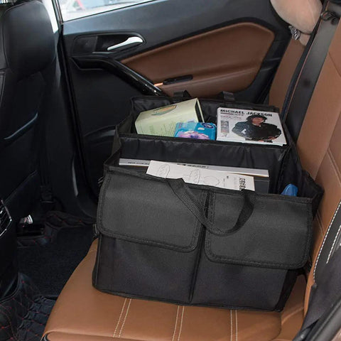 Car Trunk Backseat Organizer For SUV Eight Pocket Waterproof And Dustproof Cargo Net Storage with books and magazines inside.
