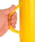 Hand gripping the handle of a Heavy Duty Semi Trailer Stabilizer Jack Stand With Twin Handles Quick Height Adjustments.