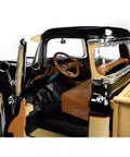 1957 Chevy 3100 Stepside Diecast Pickup 1 18 Scale Black And Tan Model with open door showing detailed interior.