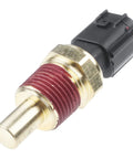 Engine coolant temperature sensor, brass threaded body with red seal and black connector (front view).