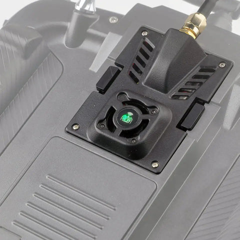 ExpressLRS Micro TX Module 2 to 4G With Cooling Fan and RGB LED, mounted on RC drone, showing top vent detail.