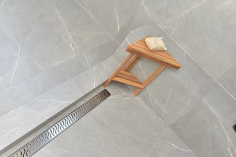 Heavy Duty 47 Inch Linear Shower Drain With Brushed Nickel Finish Solid 304 Stainless Steel Construction on modern tile floor.