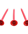 Durable Plastic Golf Tees Three And A Quarter Inch Pink 5 Pack Reusable Virtually Unbreakable For Longer Straighter Drives A Tough Polymer Tee System For Golfers Who Want Tees That Last, showing three pink tees with brand logo.