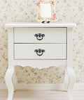 White dresser with Antique Ring Handle Drop Pulls 2.56 Inch Cabinet Hardware, vintage zinc alloy, floral wallpaper in background.