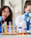 Lab scene with 11 Hole Wood Test Tube Rack For 21.5mm Diameter Tubes in use, holding glass tubes during experiments