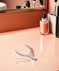 10 Pack Stainless Steel Nail Clipper Replacement Springs for Fingernail and Toenail Trimmers on pink vanity