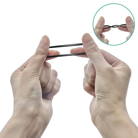 Front view of hands stretching two black Buna-N 70A O-rings, part of a metric O-ring kit