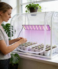 Mini Indoor Outdoor Greenhouse Grow Light Kit With Timer And Dimming, metal tabletop frame, woman tending seedlings indoors